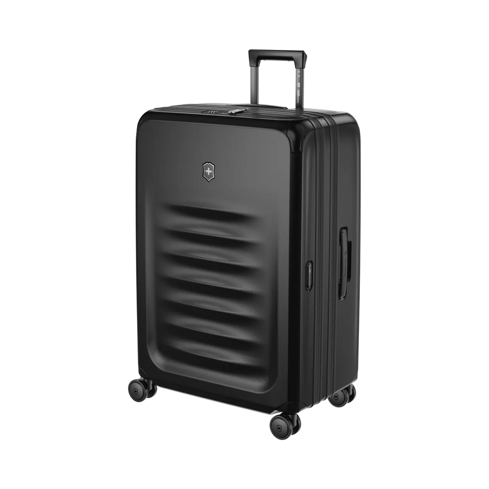 Black hardshell rolling suitcase with horizontal ridges on the front.