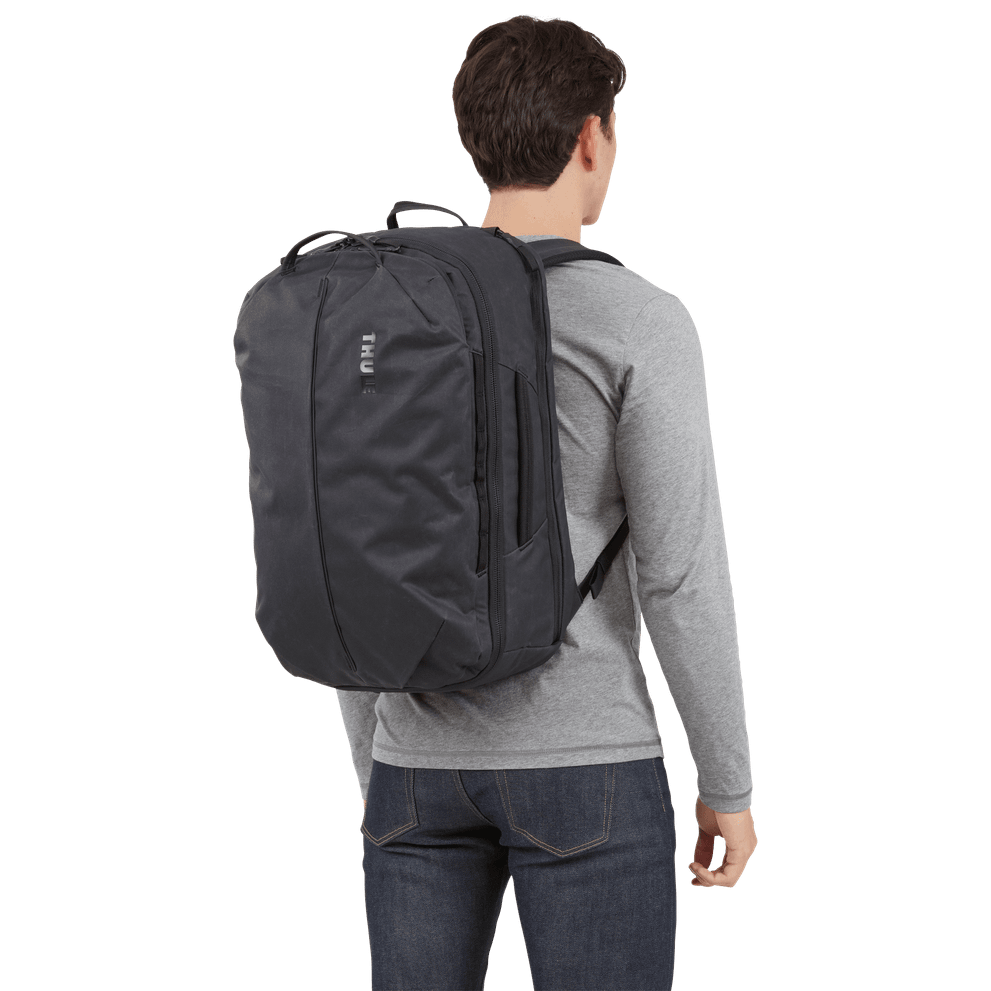 Thule Aion travel backpack 40L black with the removable TPU rolltop bag