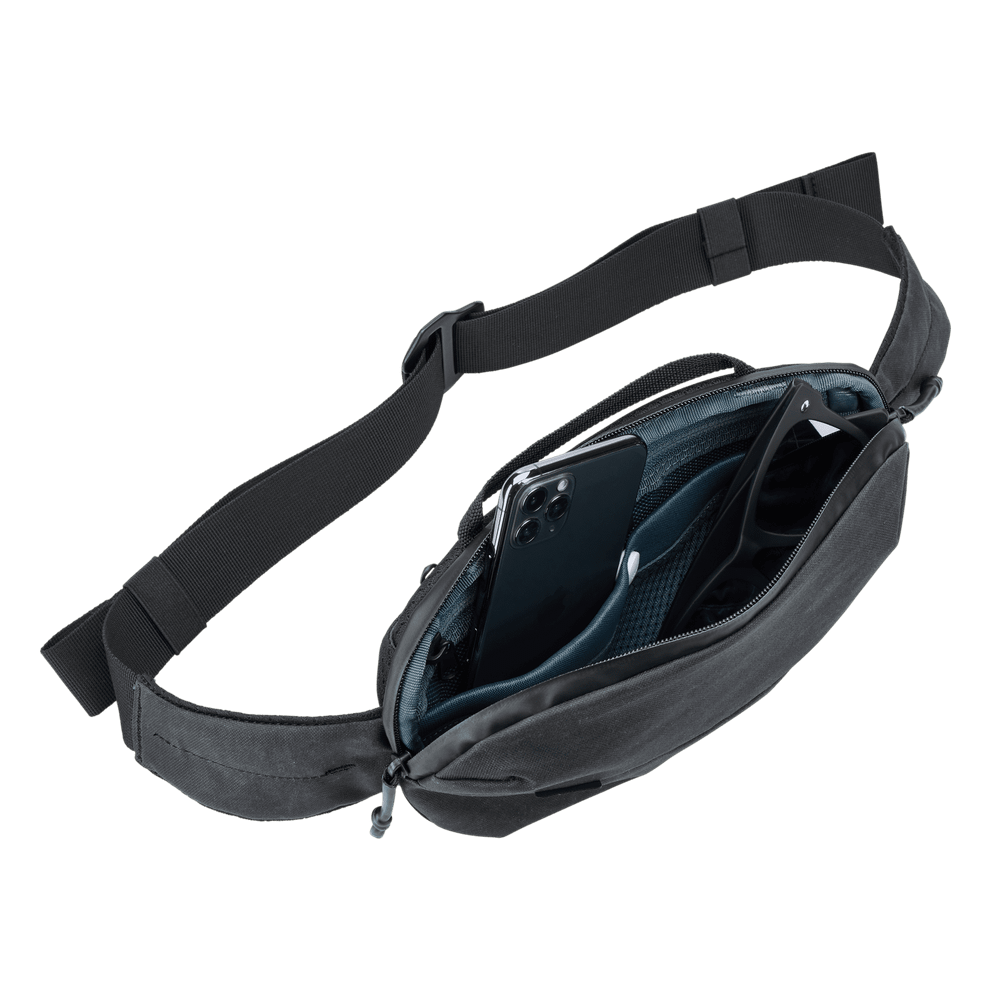 Thule Aion sling bag black unzipped, internal divider and zippered pocket
