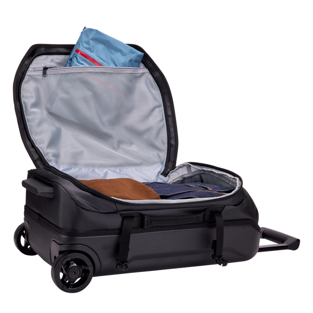 Thule Chasm carry-on wheeled duffel 40L black with compression straps tightened