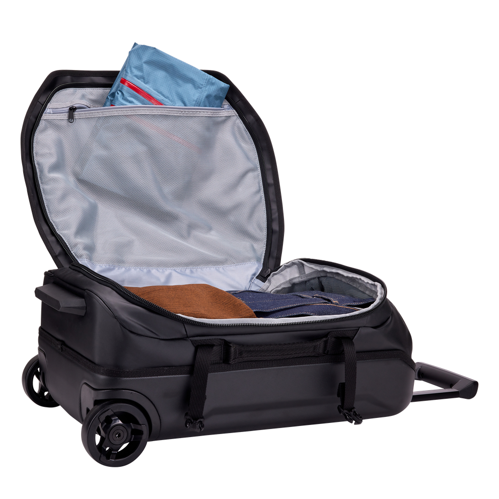 Thule Chasm carry-on wheeled duffel 40L black with compression straps tightened