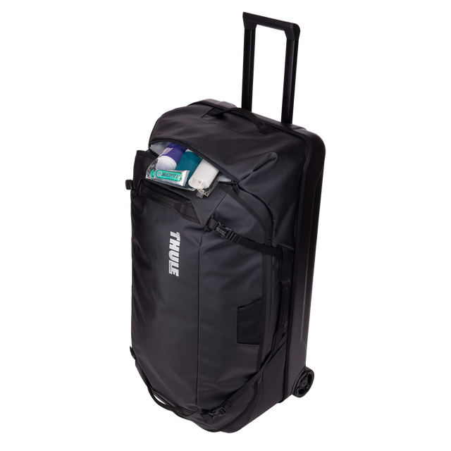 Thule Chasm rolling duffel 110L black opened wide, main compartment