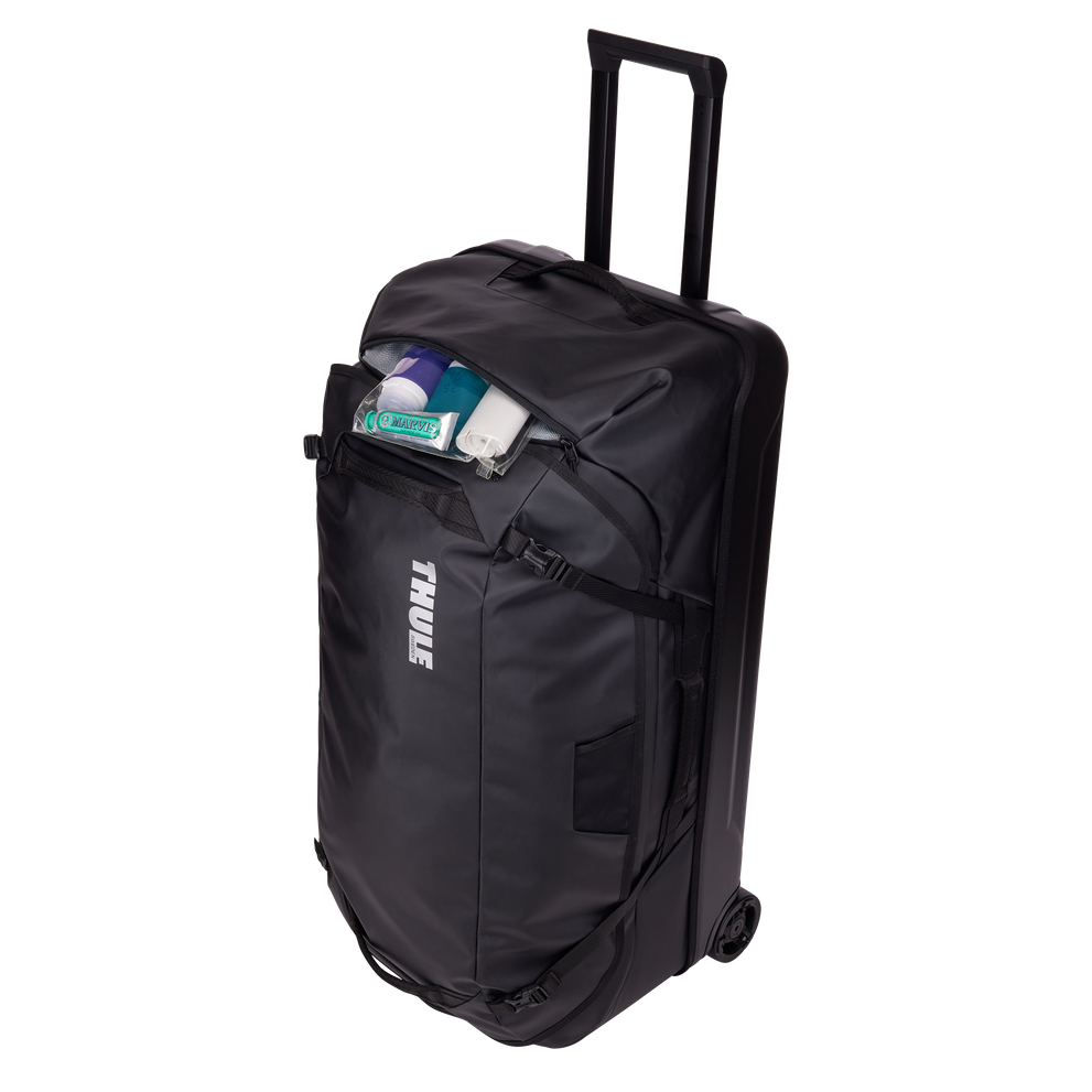 Thule Chasm rolling duffel 110L black opened wide, main compartment