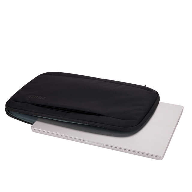 Thule Subterra 2 16in MacBook sleeve in black, open to show the ribbed EVA interior