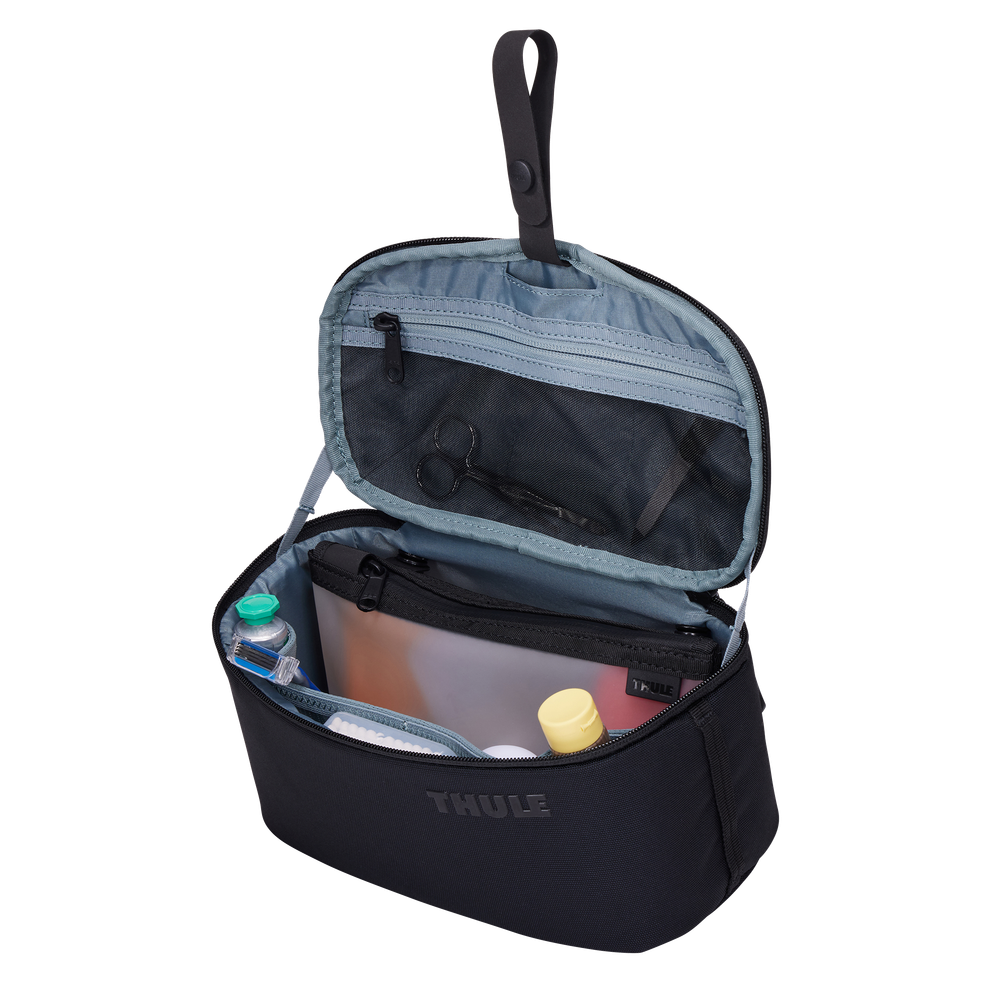 Thule Subterra 2 toiletry bag black hanging from its stowable hang strap