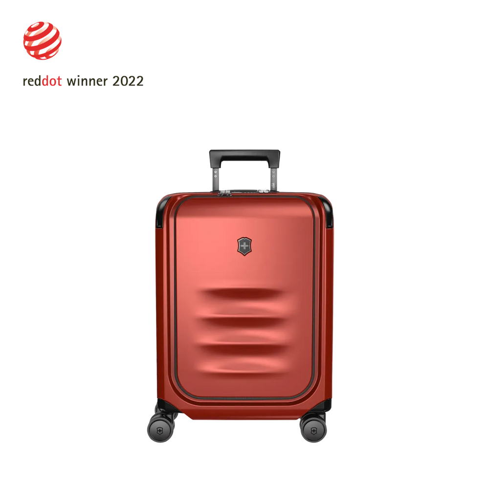 Red hardshell rolling suitcase with horizontal ridges on the front.