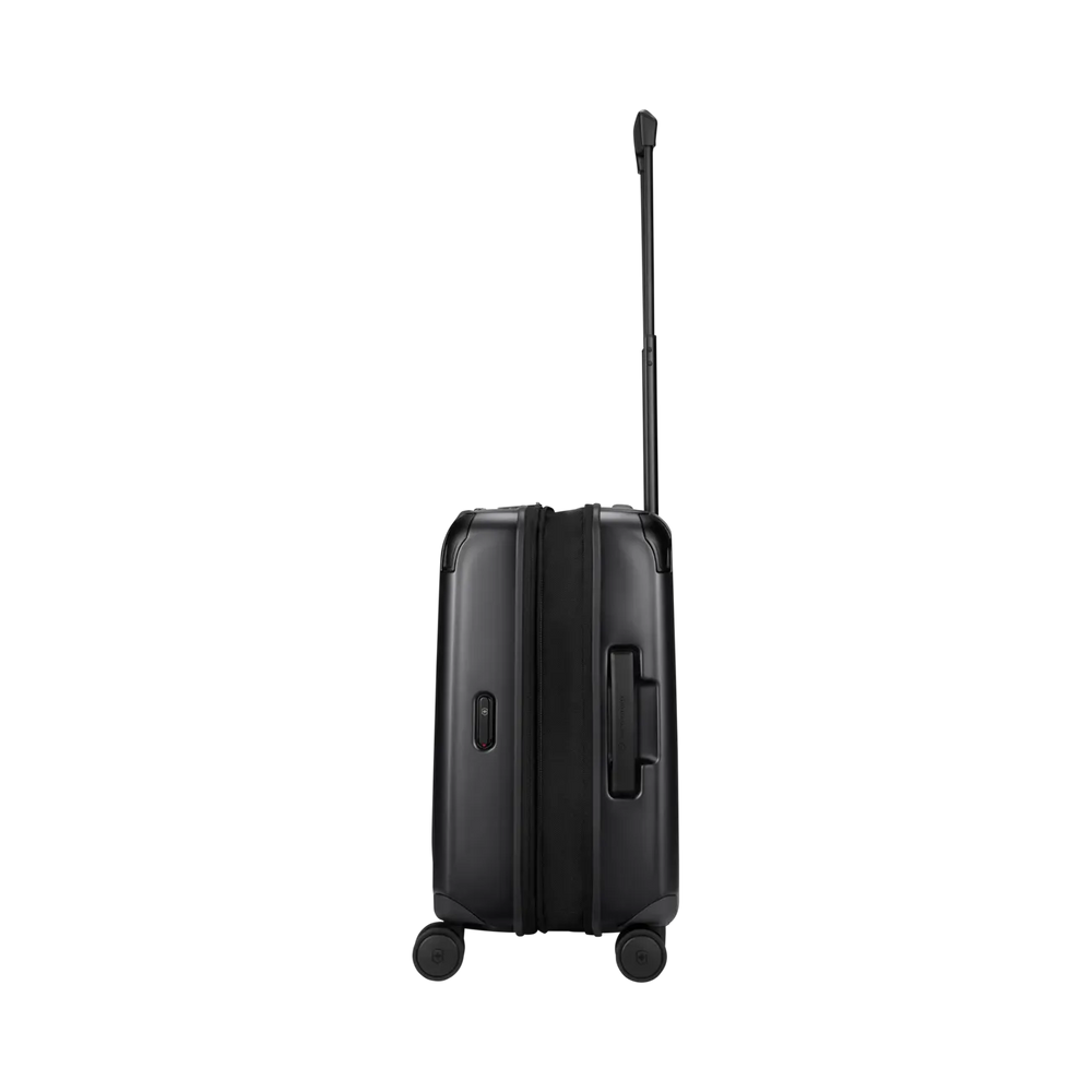 Black hard-shell rolling suitcase with an extendable handle.
