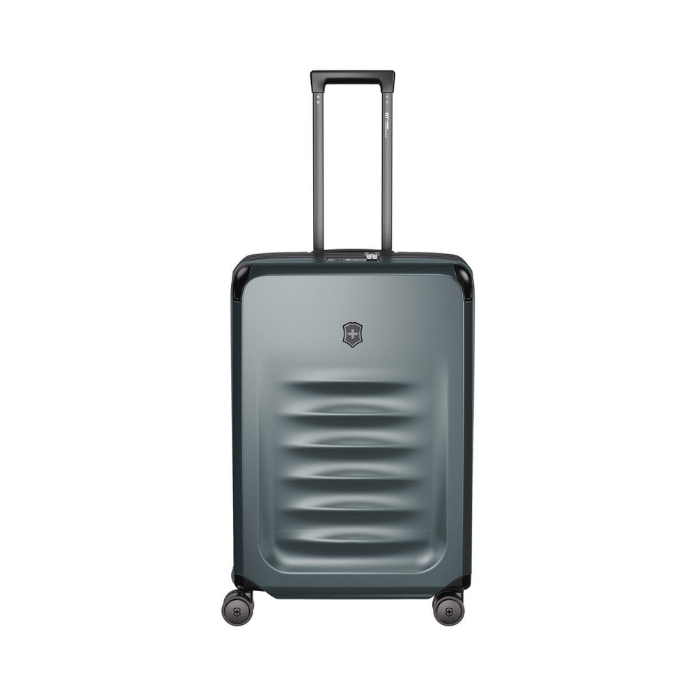 Gray hardshell rolling suitcase with horizontal ridges on the front.