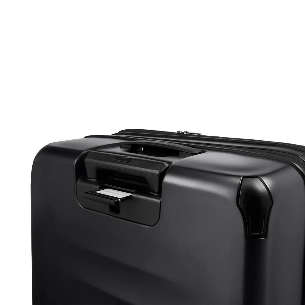 Black hardshell suitcase with a retractable handle.