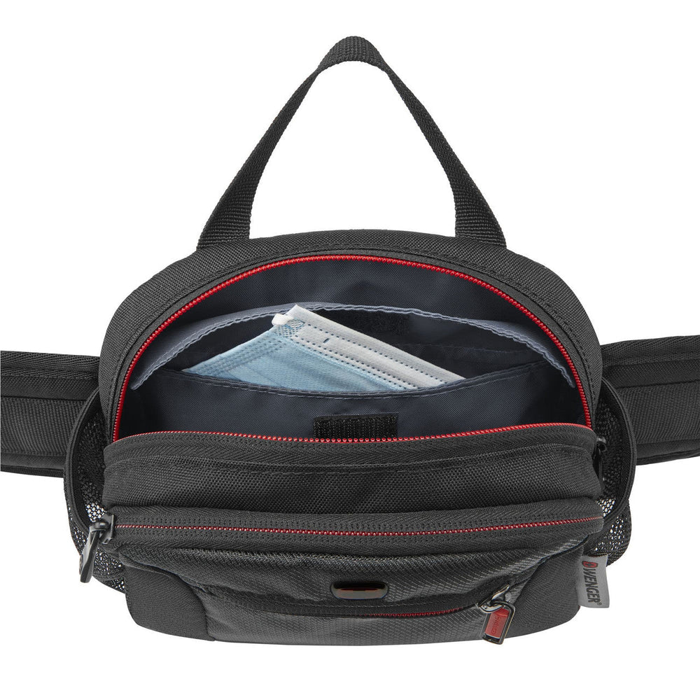Black fanny pack with red trim and multiple zippered compartments.