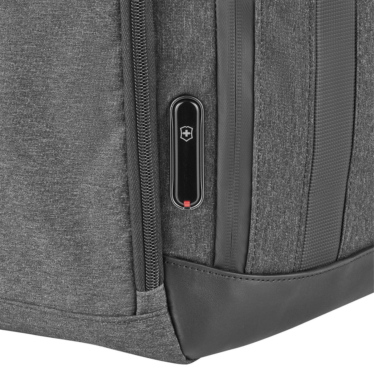 Close-up of a gray backpack zipper with a Victorinox Swiss Army logo.