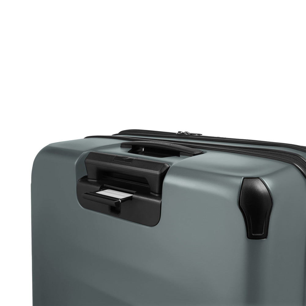 Gray hardshell suitcase with a retractable handle and zipper.