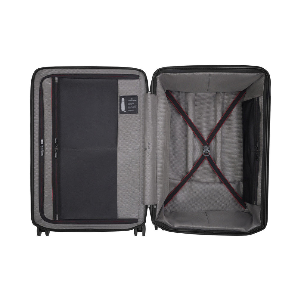 Open suitcase showing its interior compartments and straps.