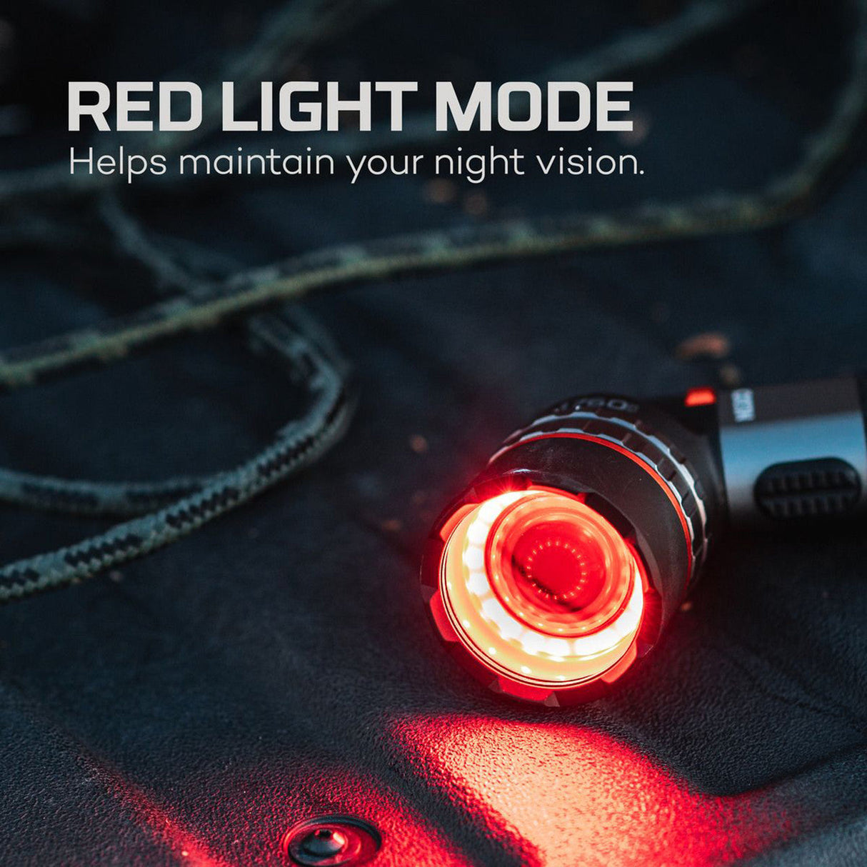 Flashlight with a glowing red LED light in its ’Red Light Mode’.