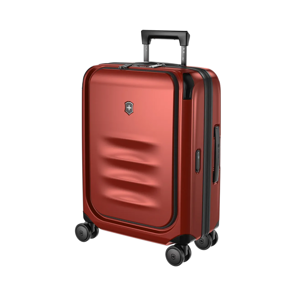 Red hardshell rolling suitcase with a retractable handle and wheels.