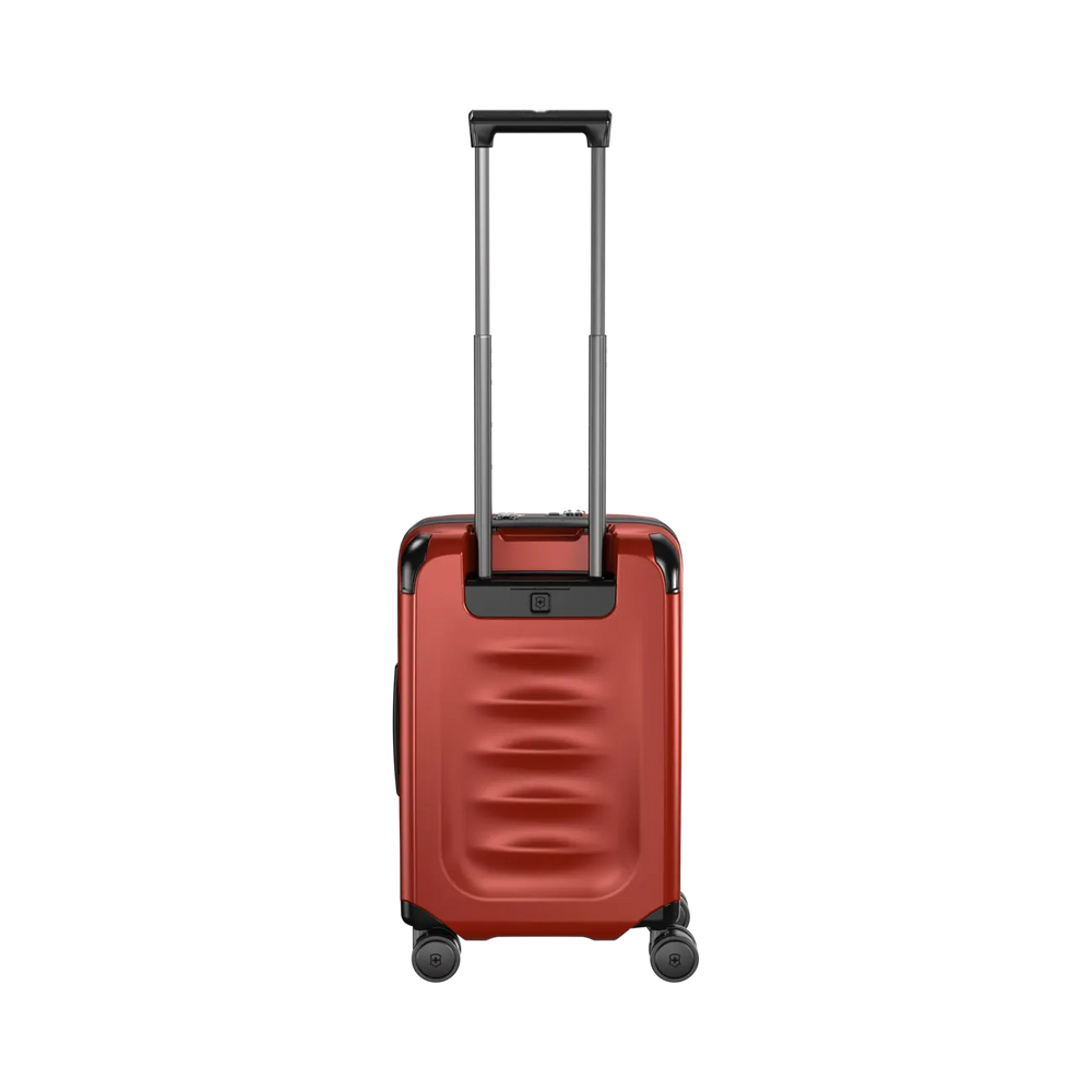 Red hardshell rolling suitcase with an extendable handle and wheels.