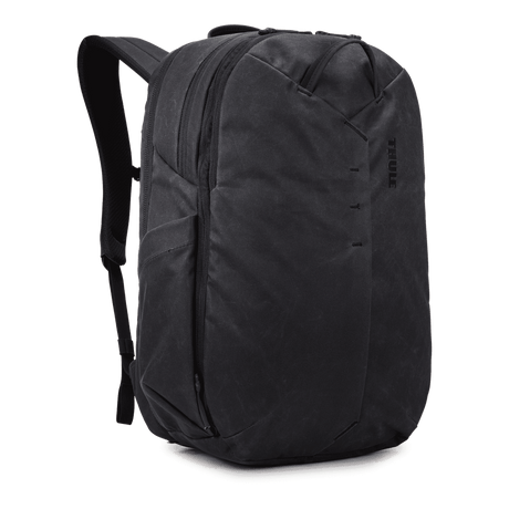 Thule Aion travel backpack 28L black, angled view with top grab handle