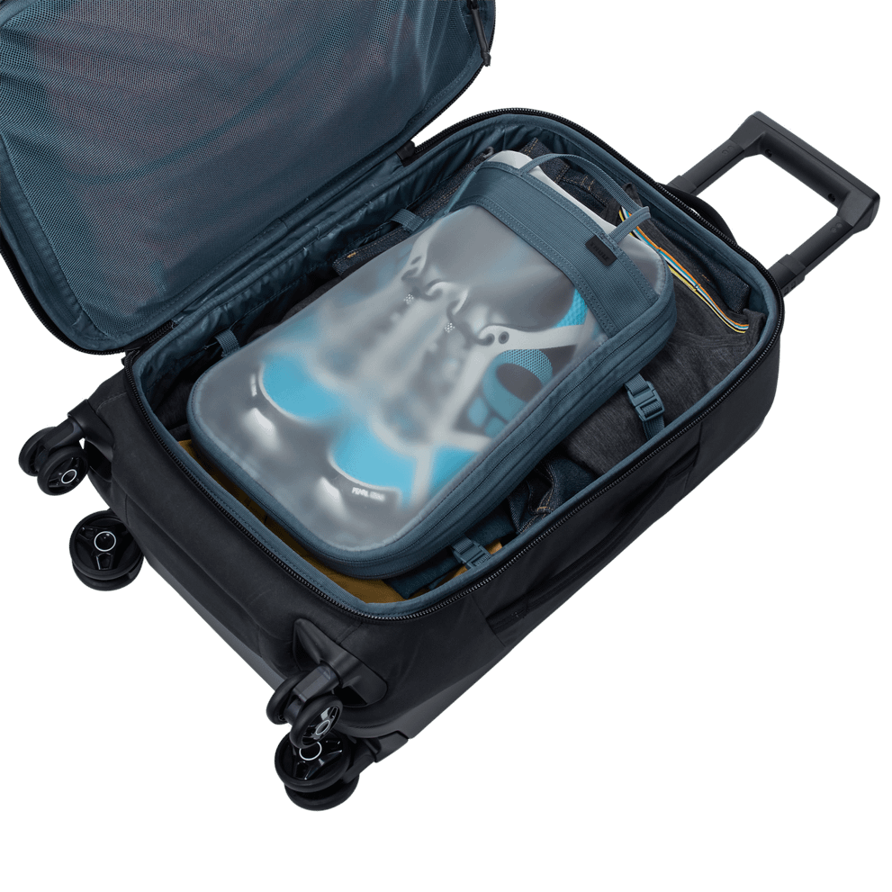 Thule Aion carry-on spinner black, side profile with front zip pocket