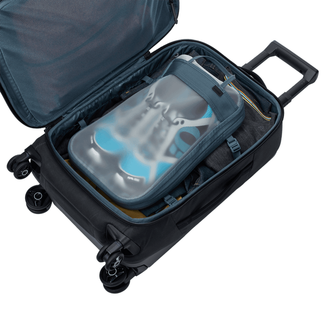 Thule Aion carry-on spinner black, side profile with front zip pocket
