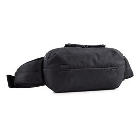 Thule Aion sling bag in black waxed canvas, front view