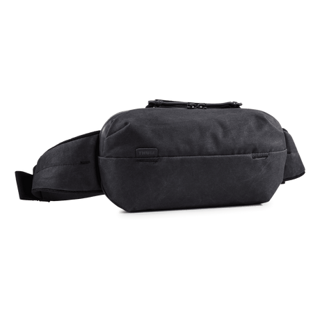 Thule Aion sling bag in black waxed canvas, front view