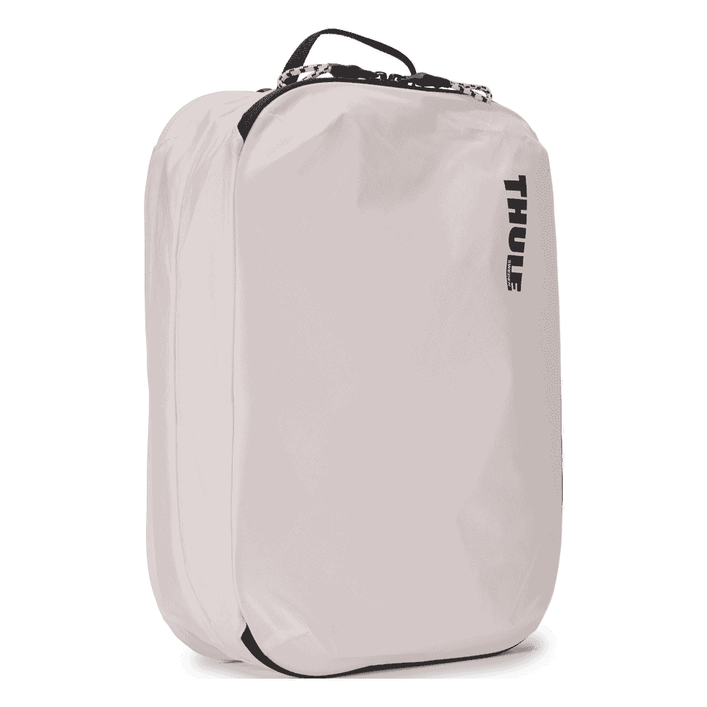 Thule clean dirty packing cube white, angled view with webbing handle