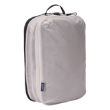 Thule clean dirty packing cube white unzipped, showing the TPU divider