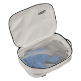 Thule clean dirty packing cube white packed with clothes on both sides