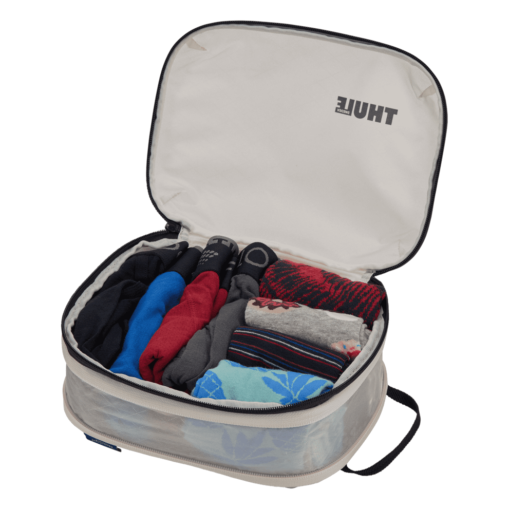 Thule compression packing cube small in white, detail of the two-way YKK zips