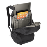 Thule EnRoute backpack 21L in black, side profile with the mesh water bottle pocket