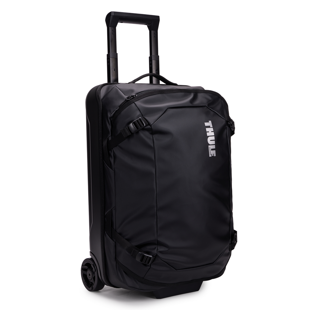 Thule Chasm carry-on wheeled duffel 40L black, angled view with handle up