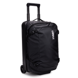 Thule Chasm carry-on wheeled duffel 40L black, angled view with handle up