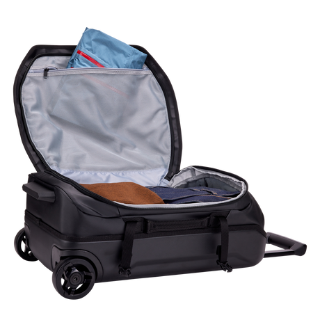 Thule Chasm carry-on wheeled duffel 40L black with compression straps tightened