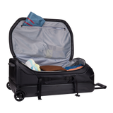 Thule Chasm rolling duffel 110L black showing external compression straps