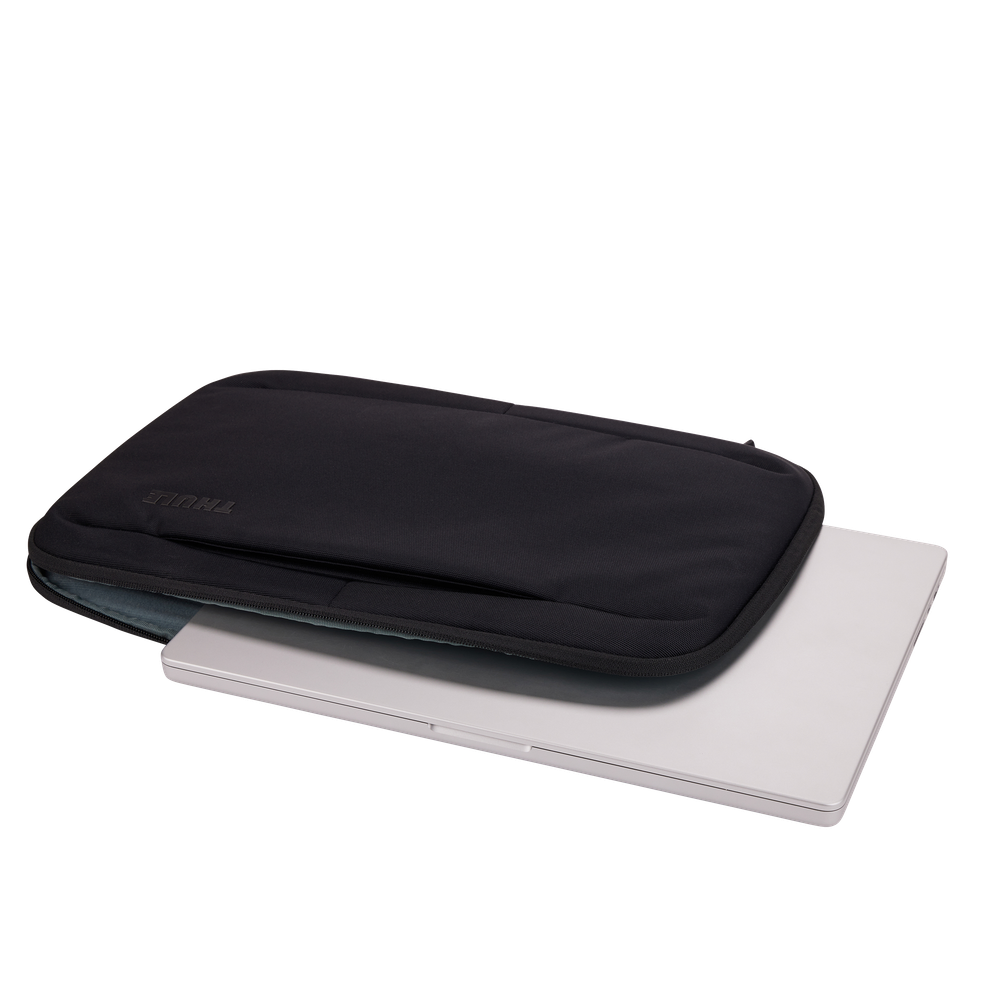 Thule Subterra 2 16in MacBook sleeve in black, open to show the ribbed EVA interior