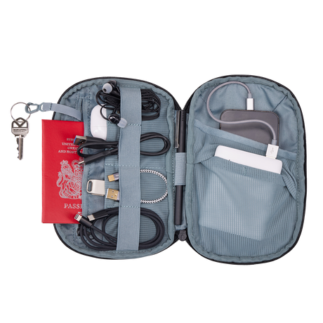 Thule Subterra 2 PowerShuttle Medium black, exterior slip pocket holding a passport