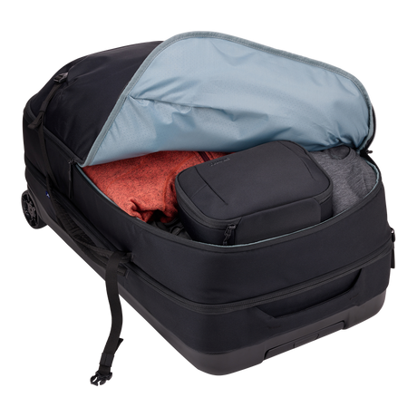 Thule Subterra 2 wheeled duffel black, opened to show the fold-flat divider