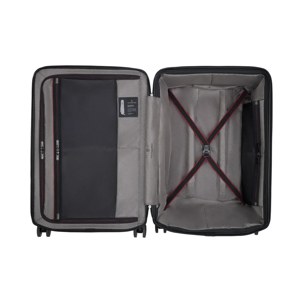 Open suitcase showing its interior compartments and straps.