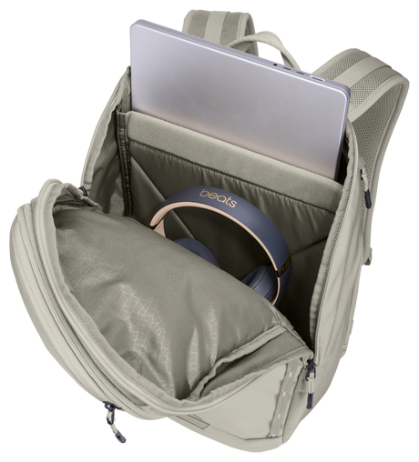 Thule Chasm laptop backpack 26L in Soft Sand, side zip open to reach the padded laptop sleeve