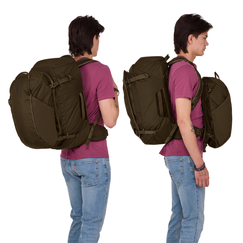 Thule Landmark 60L travel pack in deep khaki, main compartment opened to show compression straps