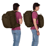 Thule Landmark 60L travel pack in deep khaki, main compartment opened to show compression straps