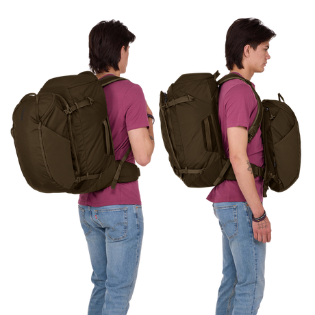 Thule Landmark 60L travel pack in deep khaki, main compartment opened to show compression straps