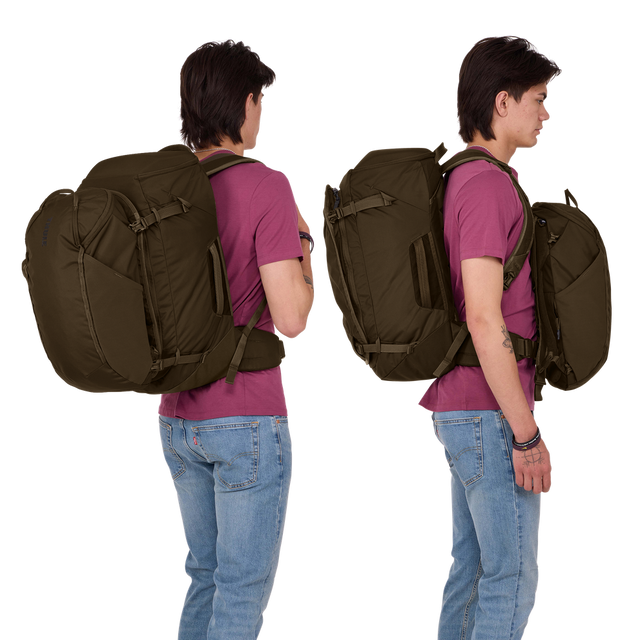 Thule Landmark 60L travel pack in deep khaki, main compartment opened to show compression straps