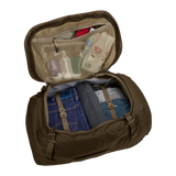 Thule Landmark 60L travel pack in deep khaki, SafeZone compartment holding sunglasses and a phone