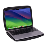 Thule Gauntlet MacBook Pro sleeve 14in in black, clamshell opened flat with a laptop inside