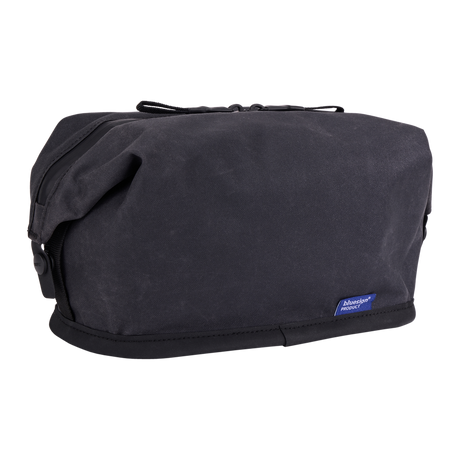 Thule Aion toiletry bag black unzipped, structured opening and internal pockets