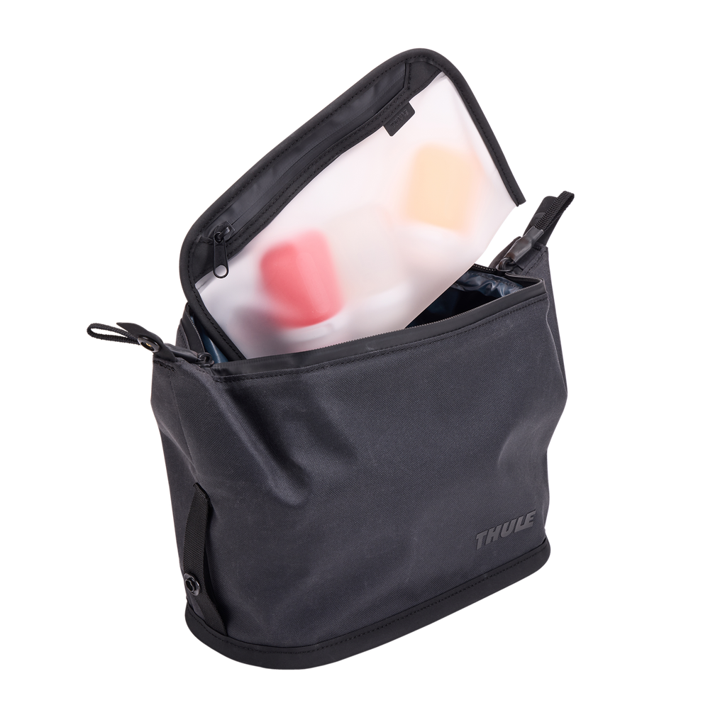 Thule Aion toiletry bag black with the removable 3-1-1 liquids pouch alongside