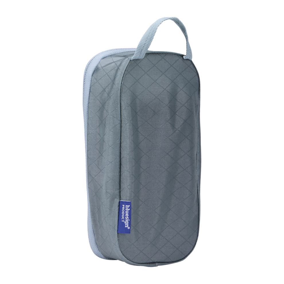 Thule packing cube x-small in Pond Gray, side profile showing the webbing carry handle