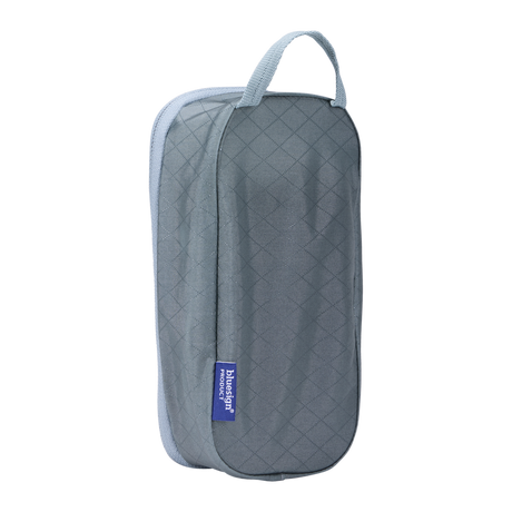 Thule packing cube x-small in Pond Gray, side profile showing the webbing carry handle