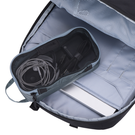 Thule packing cube x-small in Pond Gray, packed inside a daypack